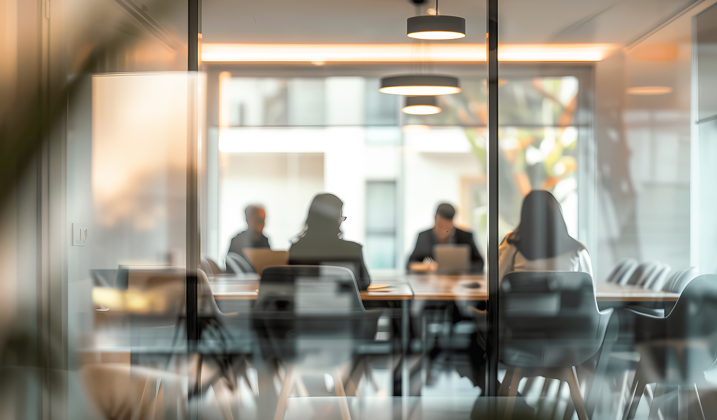 A group of people sitting in a room
